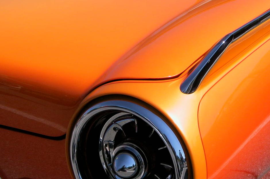 AUTOMOTIVE Exterior - Form, color and composition study of a dreamsicle orange '66 Ford Falcon. Color correction, highlights and eliminated unwanted reflections. Image used in automotive publication.